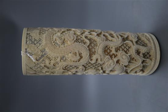 An early 20th century Chinese pierced ivory dragon brush pot, height 21cm